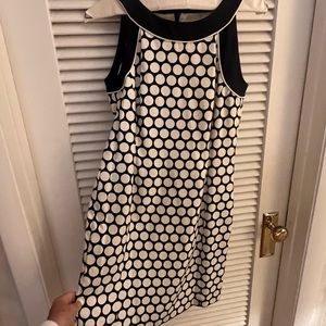 Ann Taylor dark navy sleeveless dress with large off-white polka dots.